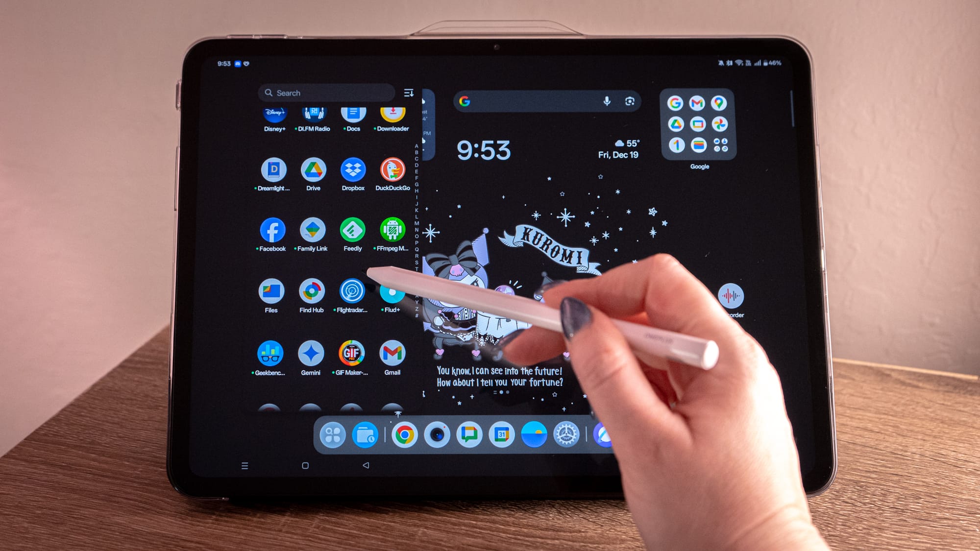 A photo of a person using the Stylo to navigate the OnePlus Pad Go 2's interface. 