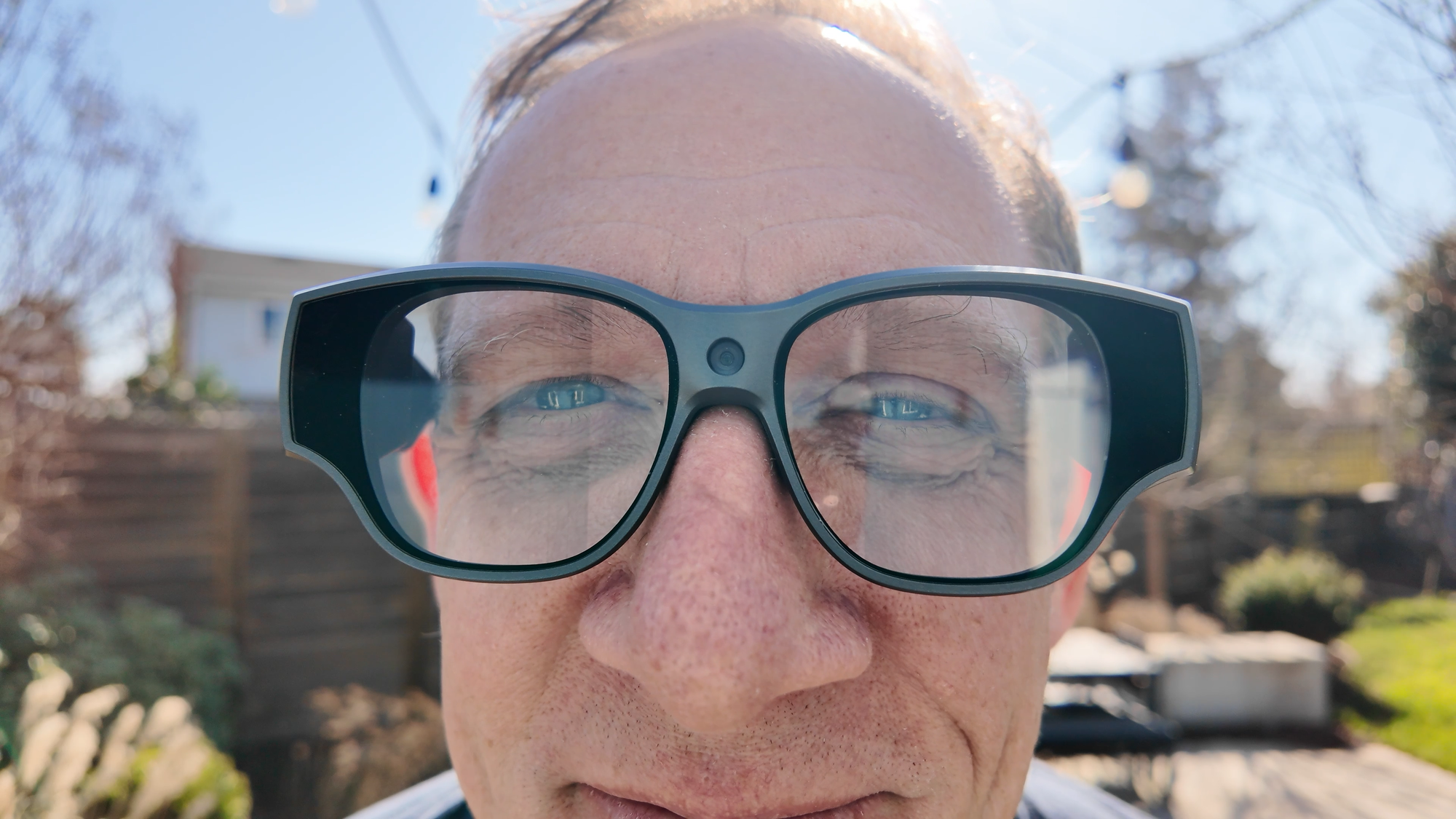 a photo of Jason wearing glasses on the face