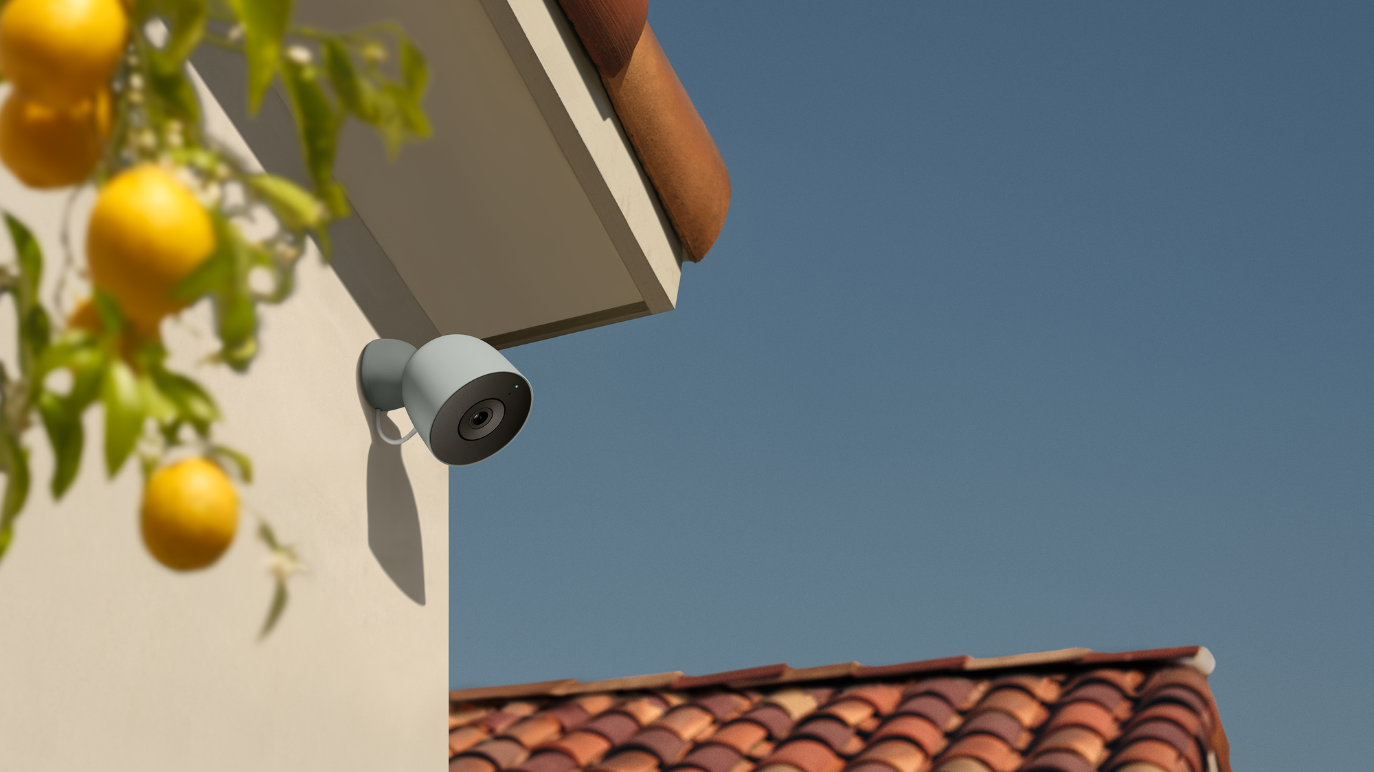 A photo of the Google Nest Cam Outdoor (2nd gen) affixed to a roof