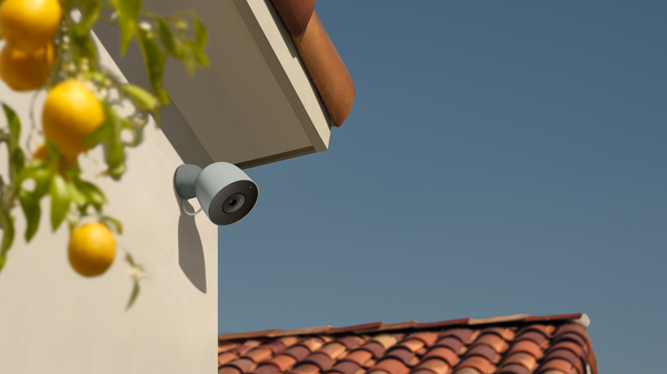 A photo of the Google Nest Cam Outdoor (2nd gen) affixed to a roof